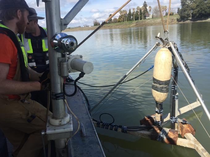 USGS boat and field crew with acoustic telemetry equipment